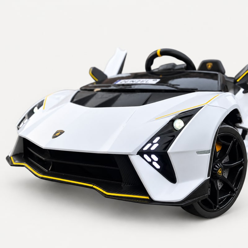 Lamborghini Authentica — White electric ride-on, front three-quarter, on a light-grey background.