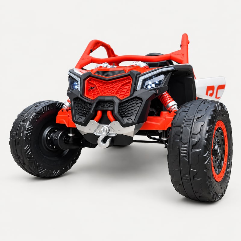 Maverick xrc max — Orange / White electric ride-on, front three-quarter, on a light-grey background.